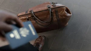 travel day habits with a traveler checking passport boarding pass and carry-on before the airport