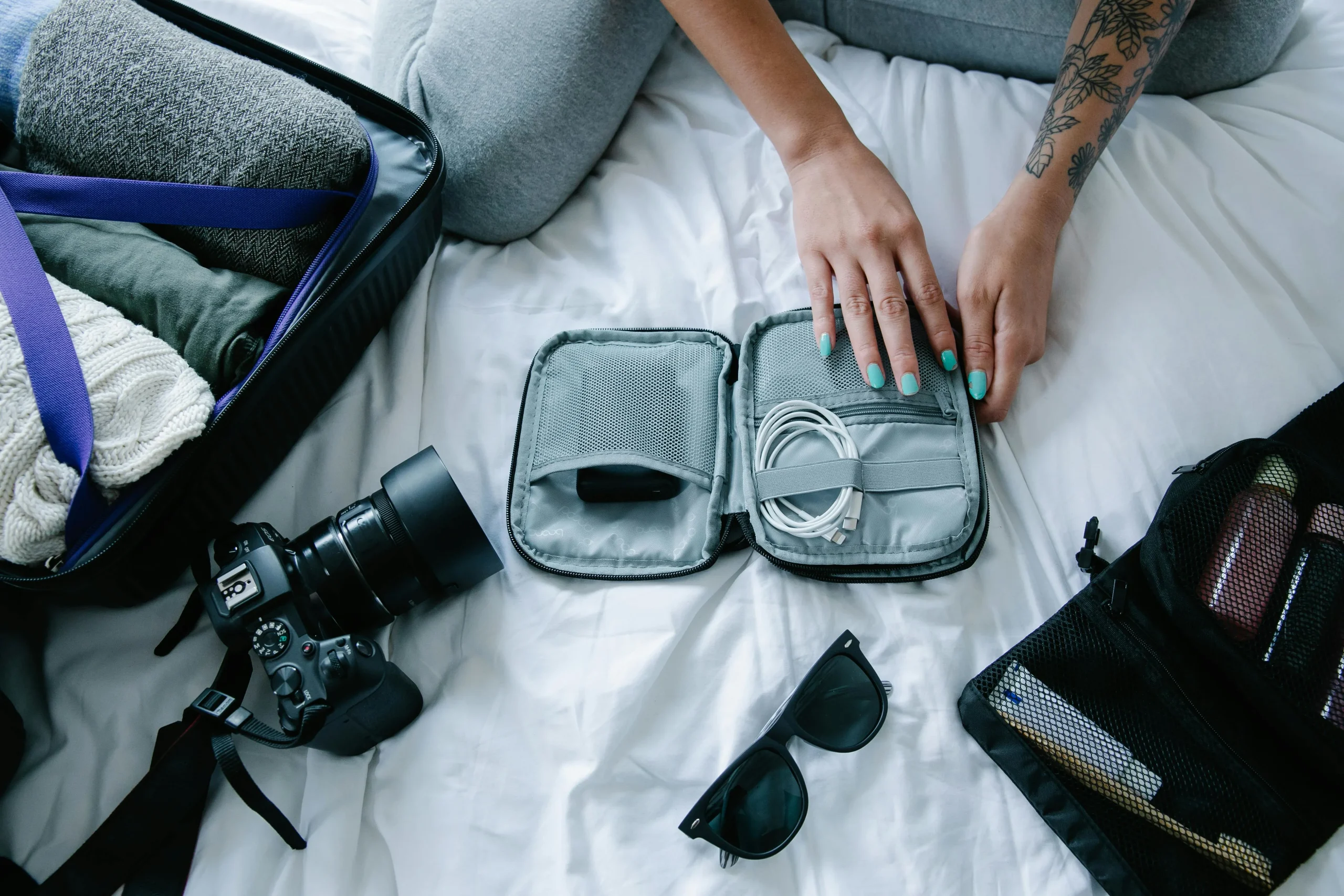 carry-on packing habits showing easy access to passport and charger at the airport