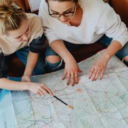 how to plan a family trip with parents organizing travel details and schedule