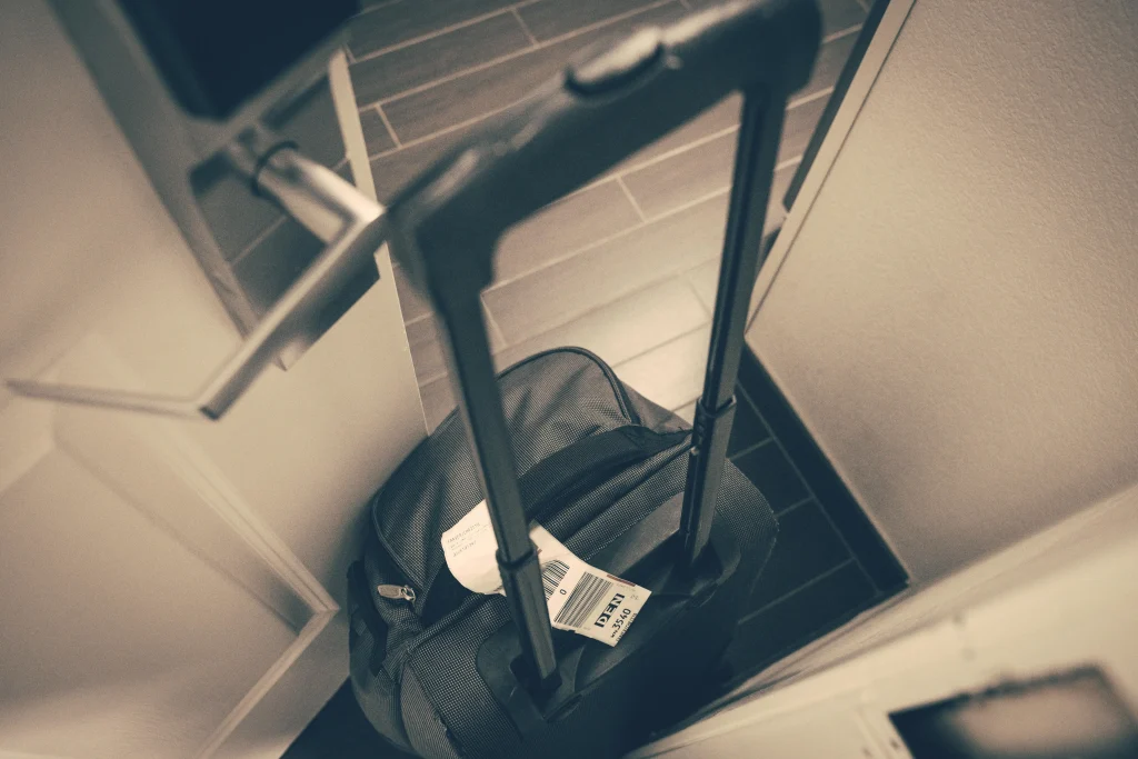 family-arrival-habits-showing-a-travel-pouch-with-snacks-medicine-and-hotel-details-for-children-1024x683 8 Family Arrival Habits That Help Travel Days Feel Easier With Children