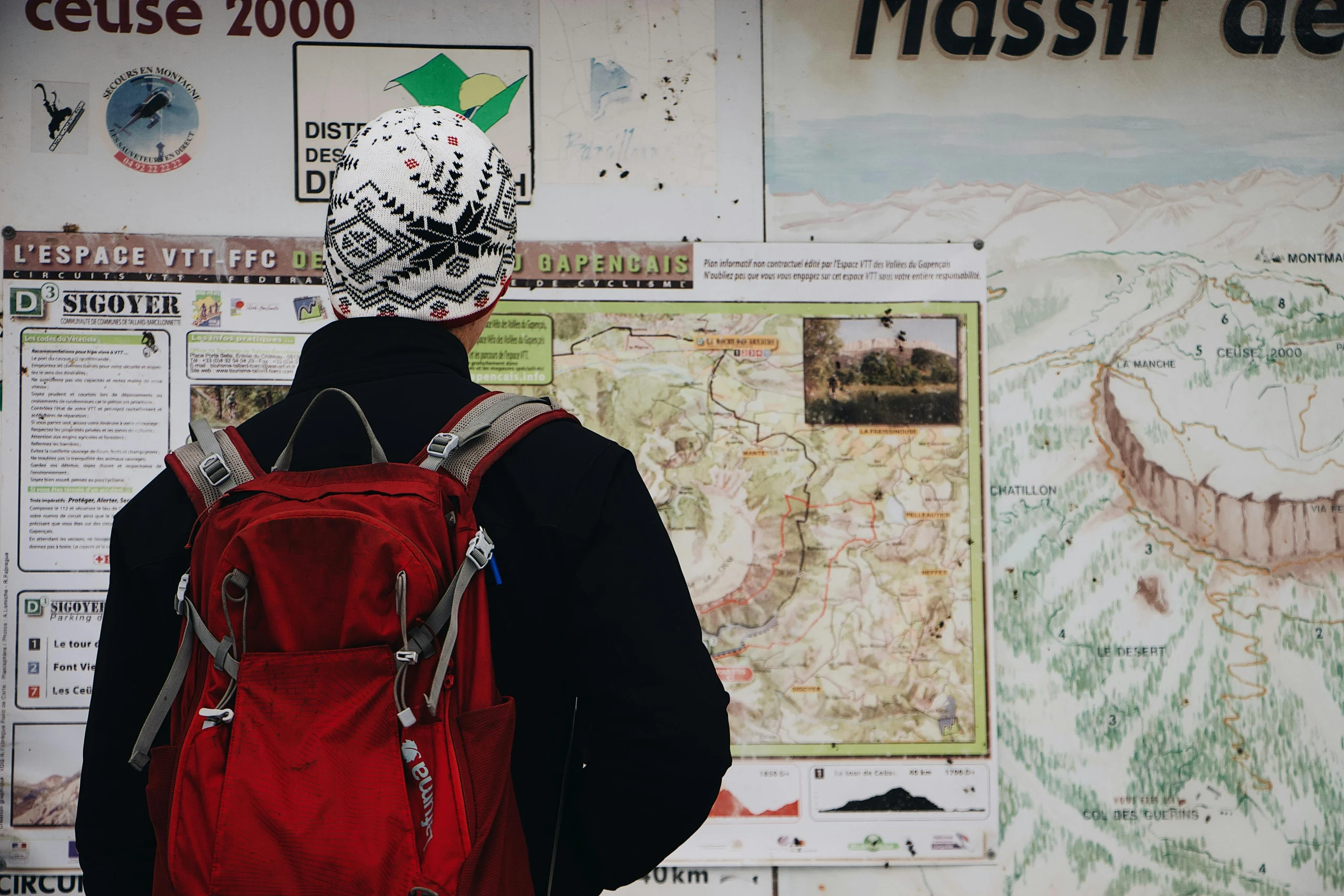 hiking routine habits with a hiker preparing at a trailhead with a backpack map and water bottle