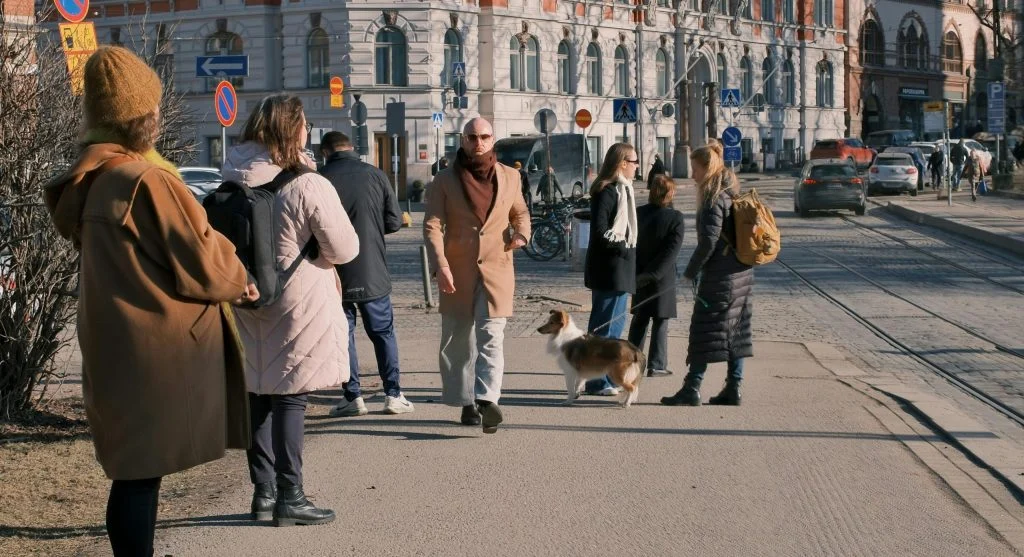 Traveler taking a photo from the side of a walkway