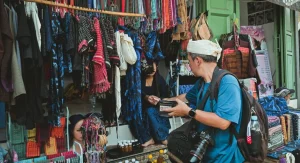 Market manners showing a traveler browsing respectfully in a local market